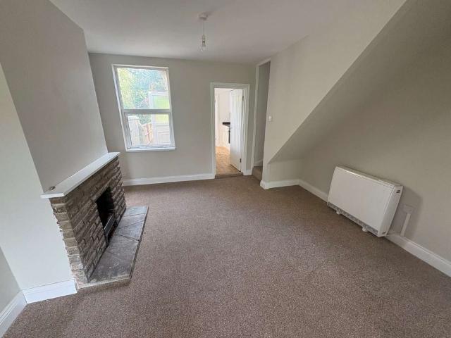 A well presented two bedroom home with neutral décor and village setting