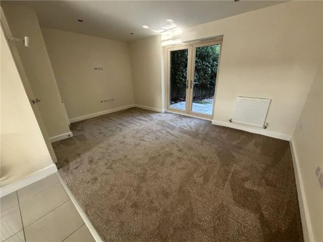 A well presented three bedroom terraced house offering spacious accommodation over three floors, with a private rear garden and allocated parking, situated on the popular Comelybank Drive development