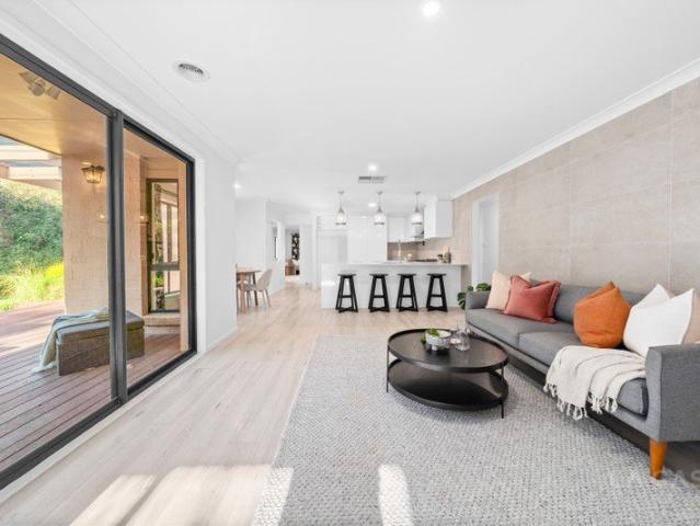 A world of exquisite design and unparalleled comfort at 21 Robinia Place