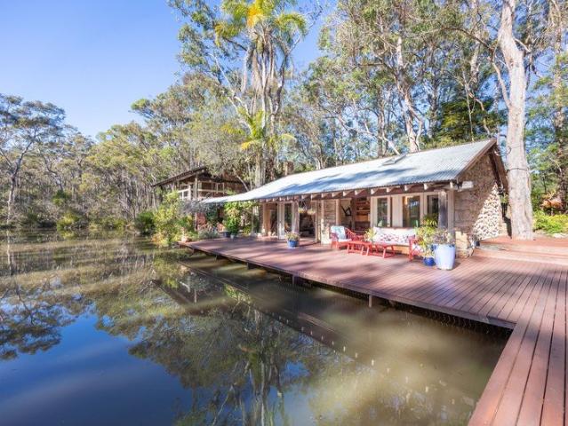 A world of lakeside tranquillity awaits on a serene 30 acres!