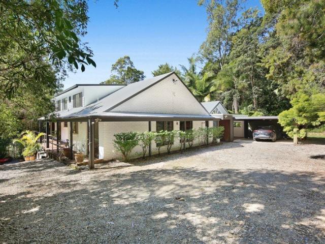 A World Away: 7.4 Acre Paradise of Picturesque Peace and Privacy
