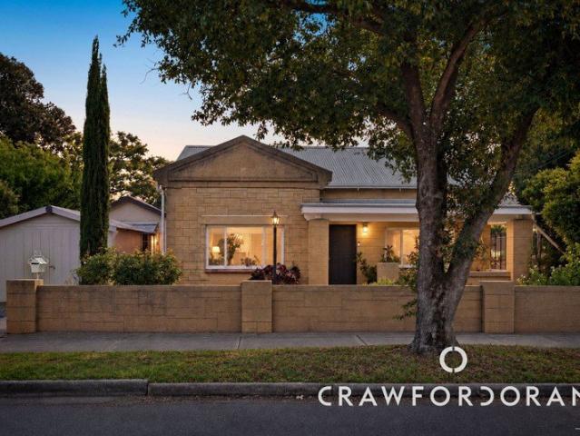 A 1930s Classic with A Fruitful Backyard and A Second Set of Keys