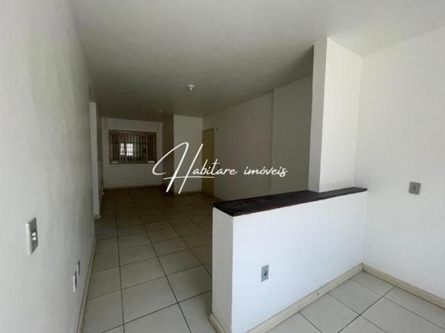 Aconchegante Apartamento Térreo com Conceito Aberto em Bairro Tranquilo!
