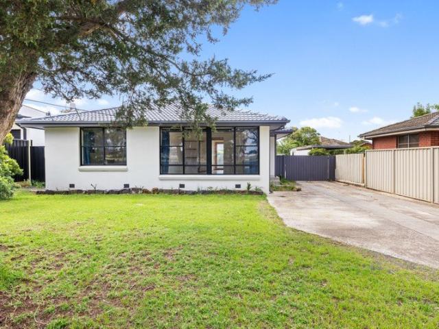 Ace Real Estate proudly presents this beautifully renovated family home, offering modern style, comfort, and convenience