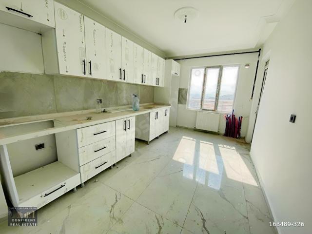ACİL BOSTANCIK MH. CADDE ÜZERİ LÜX KATTA SATILIK SIFIR 3+1 DAİRE