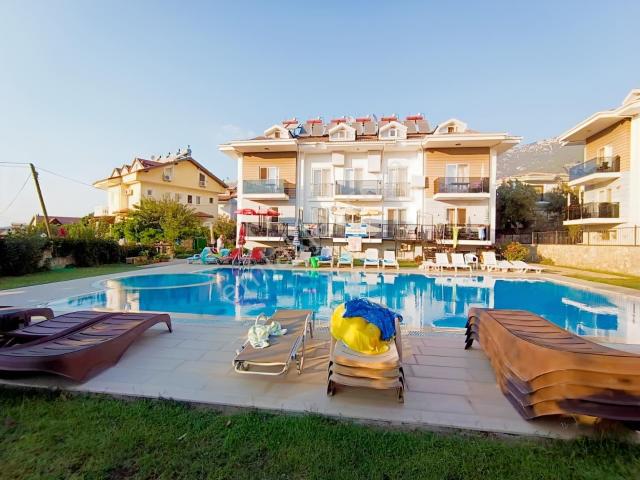 Acil Satılık Ovacıkta Havuzlu Sitede Full Eşyalı 3+1 Daire