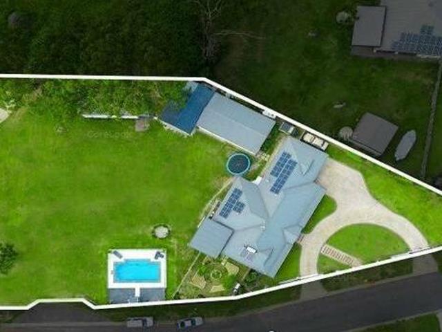 ¾ acre country retreat with pool solar and powered shed