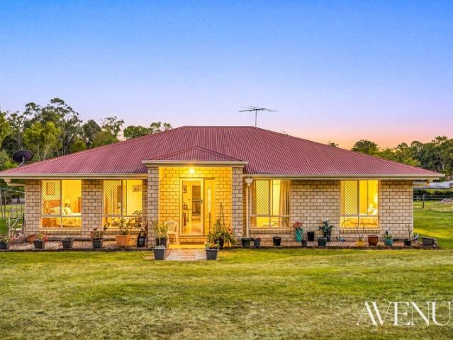 Renovator's Delight on Over 1.5 Acres with Plenty of Potential