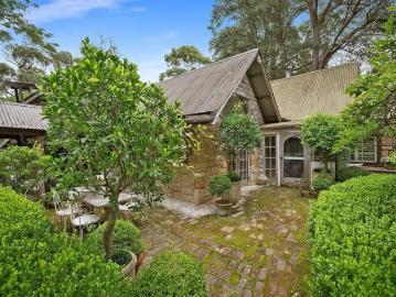 ACREAGE OPPORTUNITY WITH FOUR HOMES