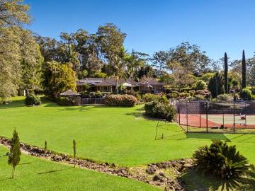 Acreage Estate, Offering Dual Living in a Prime Locale