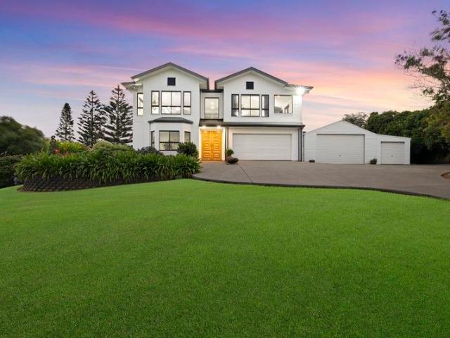 Acreage Hinterland Retreat: Elegance, Luxury, Design and Coastal Water Views!