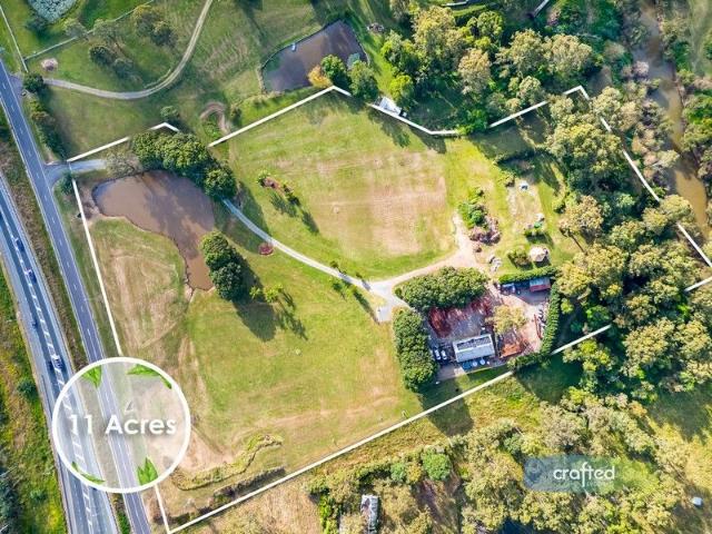 acreage life | 11 Acres of Mt Lindesay Hwy Exposure with Impressive Shed Infrastructure + Logan River Riparian Water Rights!