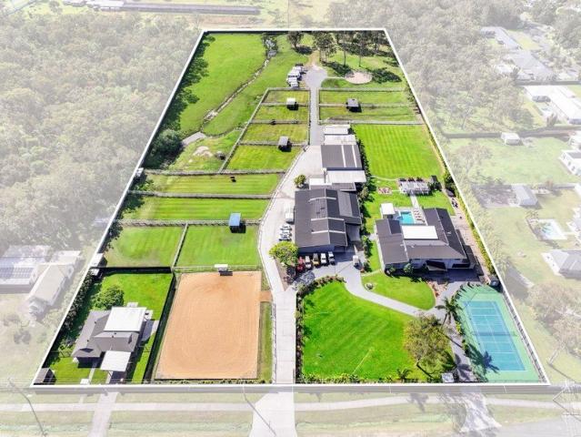 Acreage Lifestyle with Endless Flexibility and Income Opportunities