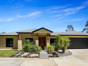 Acreage lifestyle with luxury living on 12.24 Acres