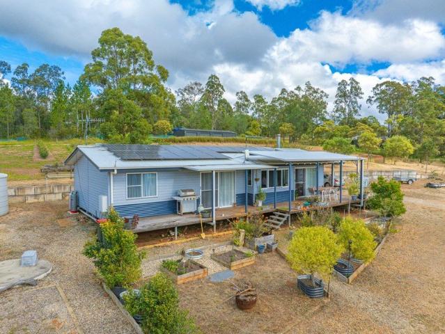 Acreage Lifestyle with Space, Privacy & Country Charm