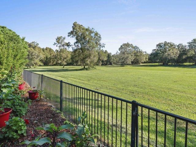 Acreage Lifestyle Without the Maintenance!