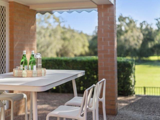 Acreage Lifestyle Without the Maintenance!