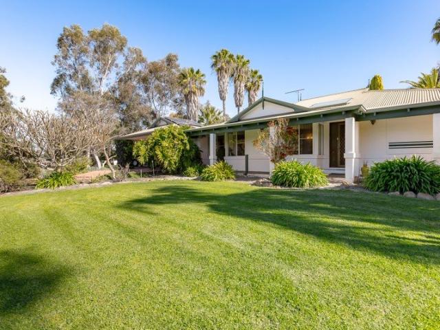 Acreage Living with Exceptional Lifestyle Features!