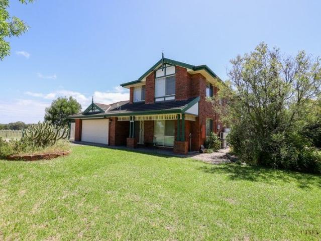 Acreage Living with Exceptional Shedding and Town Proximity