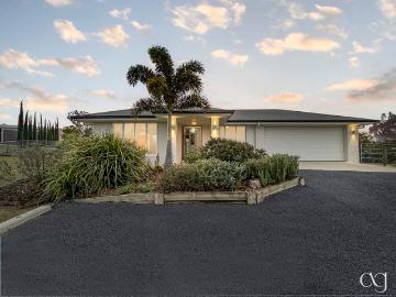 acreage living with elevated views, space & convenience