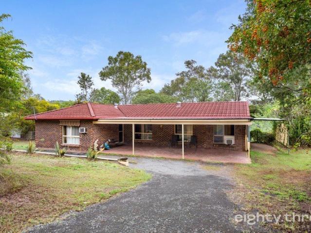 Acreage Living with Potential in the heart of Regency Downs