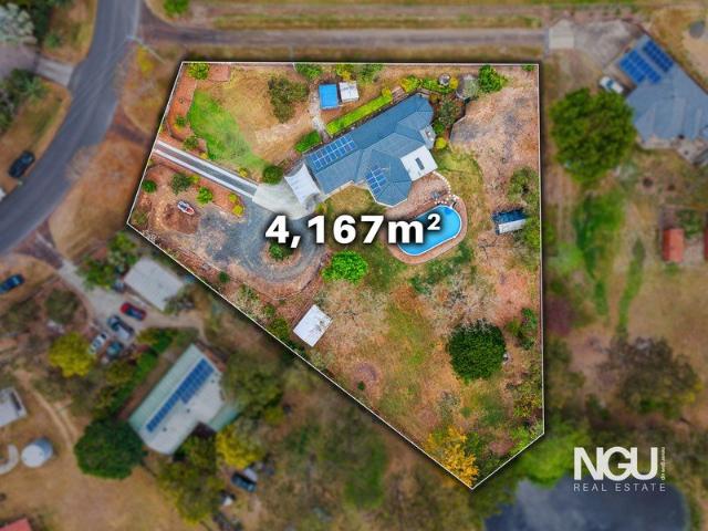 ACREAGE LIVING WITH SPACE FOR THE WHOLE FAMILY