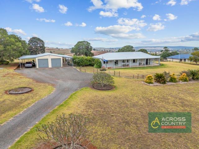 Acreage Living with Unforgettable Views Your Lifestyle Upgrade Awaits!
