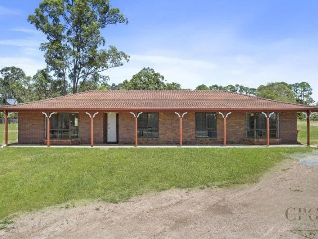 Acreage Living with Unlimited Potential in a High Growth Location