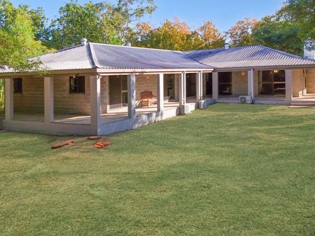 Acreage Living Made Easy Large Spacious Family Home Ready for Renovation Endless Potential on 3.83 Acres
