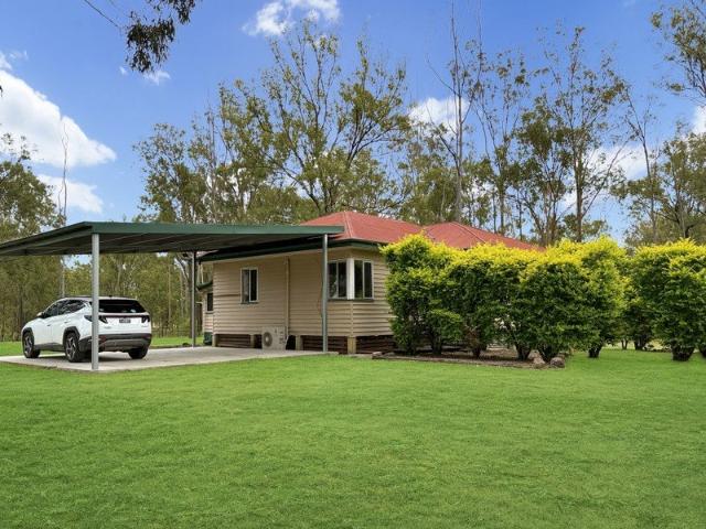 Acreage Living on 2.5 Acres Air Conditioned 3 Bedroom Home