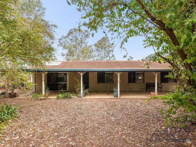 Acreage Potential with Space, Character & Equestrian Appeal