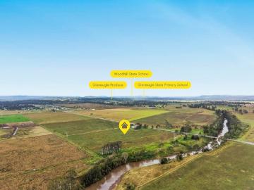 Acreage, River Frontage & Endless Potential