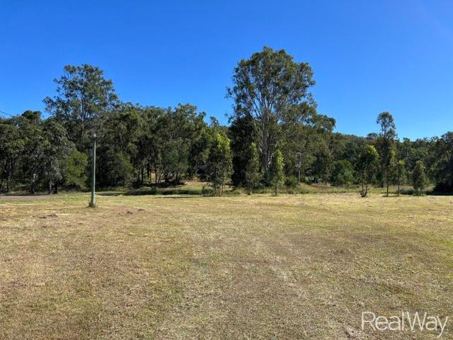 Acreage with Space, Views & Potential