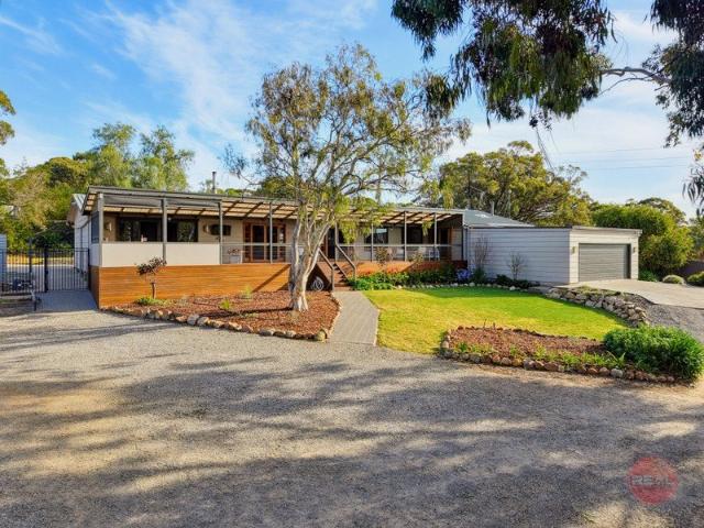 ACRES IN SUBURBIA. RARE FIND. REAL LIFESTYLE