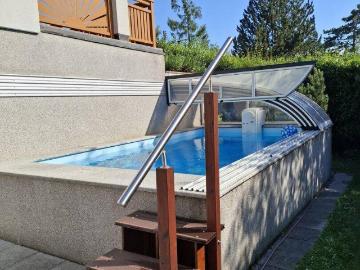 Ab ins kühle Nass: Bungalow mit Pool und zusätzlichem Baugrundstück am Schafberg mit Entwicklungspotenzial