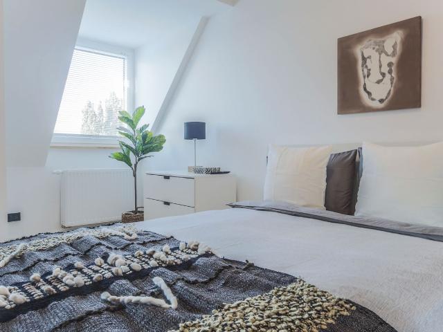 Above the roofs. Modern attic apartment in the zoo district, Dusseldorf Amsterdam Apartments for Rent