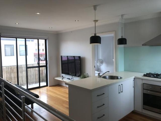 ABOVE GARAGE PARTLY FURNISHED STUDIO WITH GARAGE SPACE!