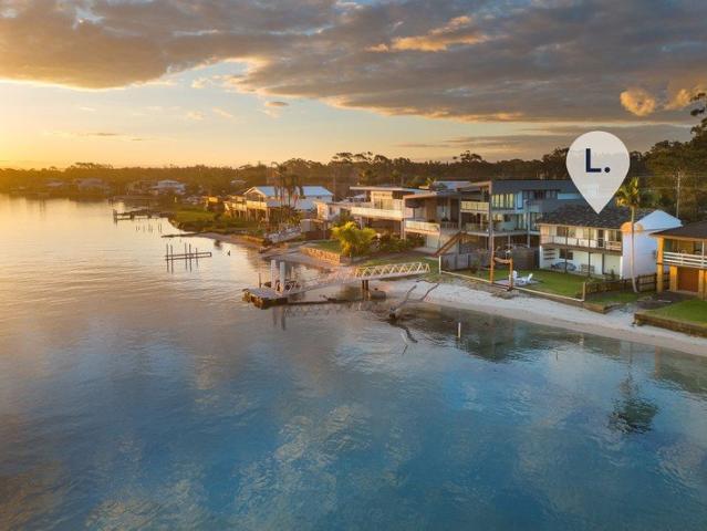 Absolute Waterfront Opportunity with Uninterrupted River Views