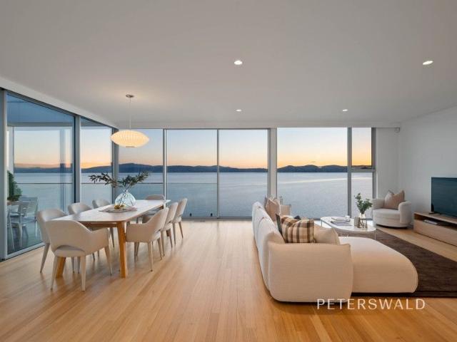 Absolute waterfront architectural excellence with beach access