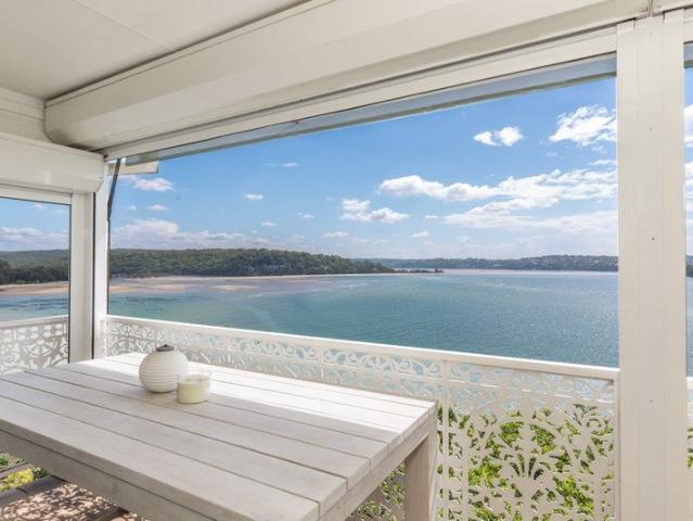Absolute Waterfront Home with Rainforest Gardens, Panoramic Views & Direct Beach Access