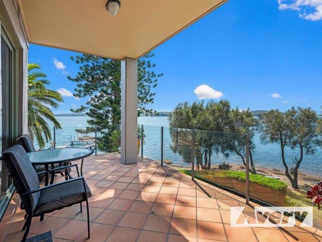 Absolute Waterfront Living with Uninterrupted Lake Views