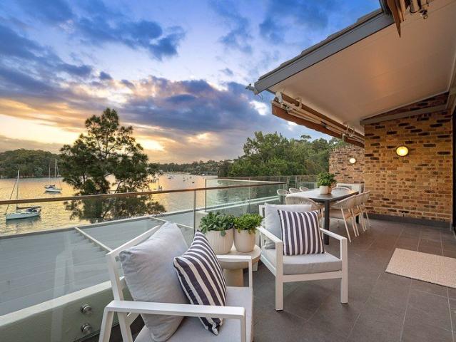Absolute Waterfront Living in Prestigious Sandpipers