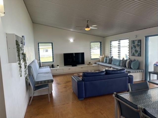 ABSOLUTE WATERFRONT LIVING ON POPULAR MORETON STREET – FURNISHED 5 BEDROOM HOME