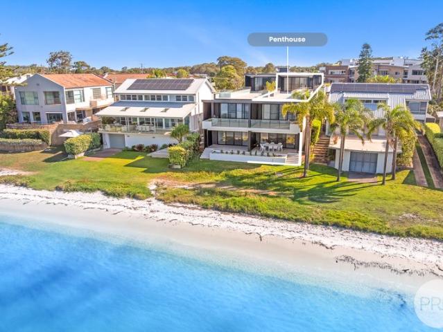Absolute Waterfront Penthouse with Spectacular Bay Views & Grand Terrace