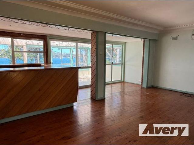 Absolute Waterfront Three Bedroom Home
