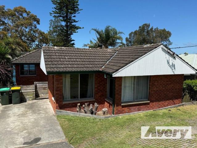 Absolute Waterfront Three Bedroom Home