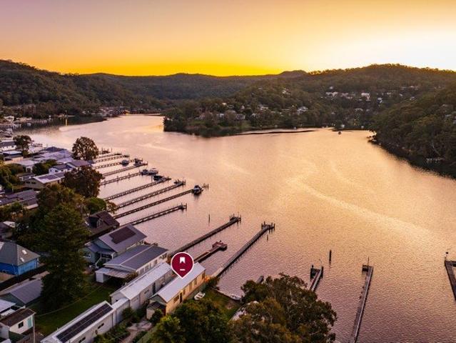 Absolute Waterfront with Historic Charm & Limitless Potential