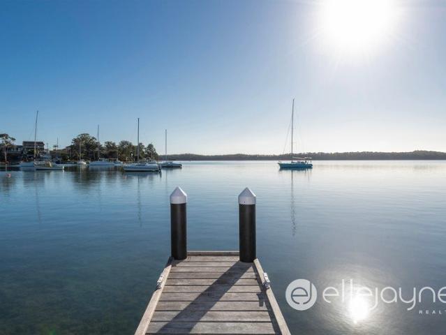 Absolute Waterfront with Private Jetty and North East Aspect