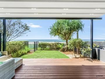 Absolute Beachfront Apartment with Ocean Views In Prime Location