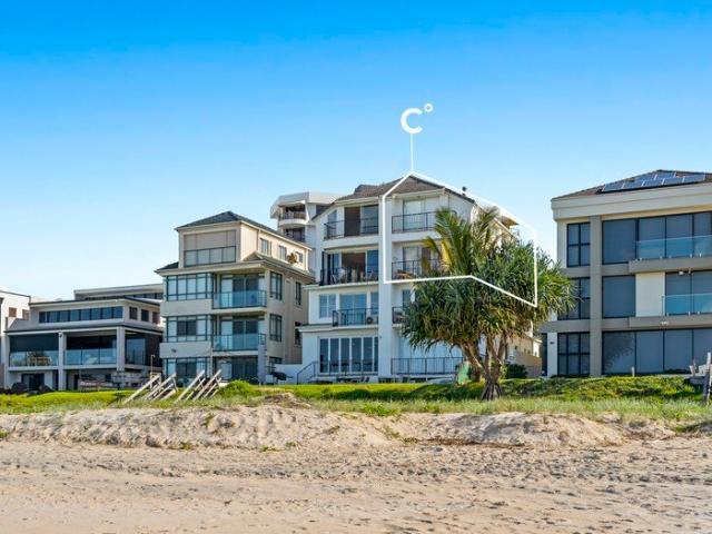 ABSOLUTE BEACHFRONT APARTMENT ON JEFFERSON LANE | 1 of 4 Residence in Building